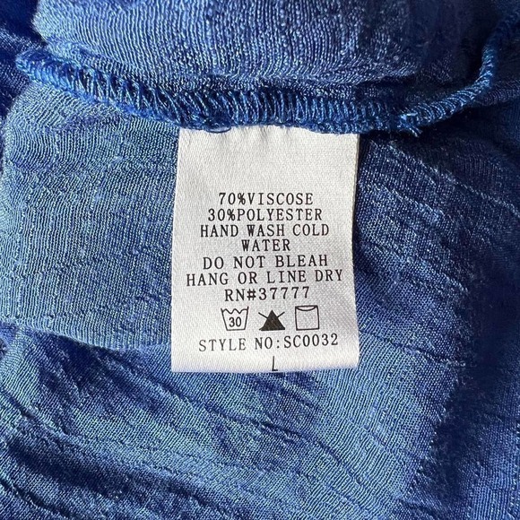 Blue flowy cold shoulder shirt by Renee C! - Picture 7 of 8